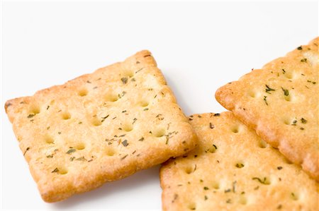 snack cracker white background - Close-up of three biscuits Stock Photo - Premium Royalty-Free, Code: 630-01709416