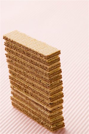 fatia fina de silício em circuitos integrados - Close-up of a stack of wafers Foto de stock - Royalty Free Premium, Número: 630-01709448