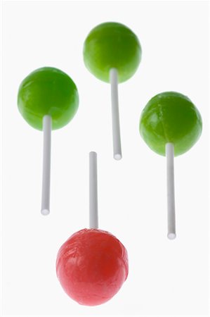 Close-up of four lollipops Stock Photo - Premium Royalty-Free, Code: 630-01709501