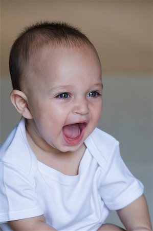Close-up of a baby boy laughing Stock Photo - Premium Royalty-Free, Code: 630-01709562