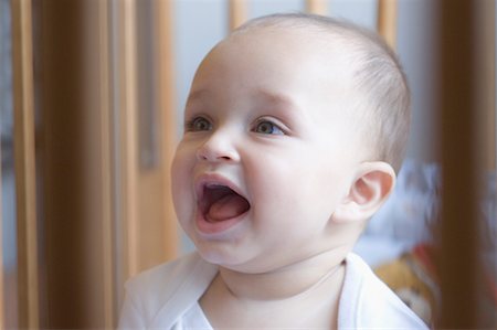 Close-up of a baby laughing Stock Photo - Premium Royalty-Free, Code: 630-01709572