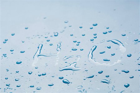 H2O written with water droplets Stock Photo - Premium Royalty-Free, Code: 630-01709803