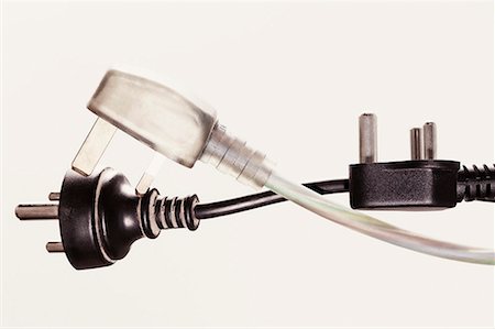 Close-up of three electrical plugs Stock Photo - Premium Royalty-Free, Code: 630-01709824