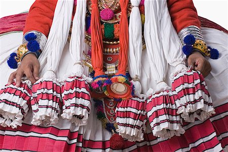Mid section view of a Kathakali dance performer Stock Photo - Premium Royalty-Free, Code: 630-01709950