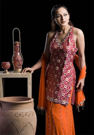 Mid adult woman standing in salwar kameez Stock Photo - Premium Royalty-Free, Code: 630-01710025