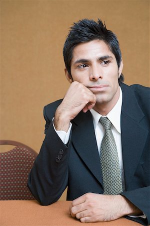 simsearch:630-02219583,k - Close-up of a businessman thinking Stock Photo - Premium Royalty-Free, Code: 630-01874105