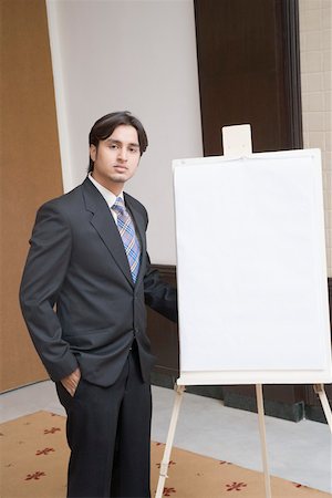 simsearch:630-01874150,k - Porträt eines Kaufmanns in der Nähe ein whiteboard Stockbilder - Premium RF Lizenzfrei, Bildnummer: 630-01874148