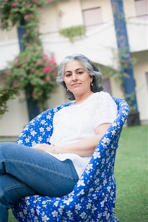 simsearch:630-01874002,k - Portrait of a mature woman sitting on a chair Stock Photo - Premium Royalty-Free, Code: 630-01874256