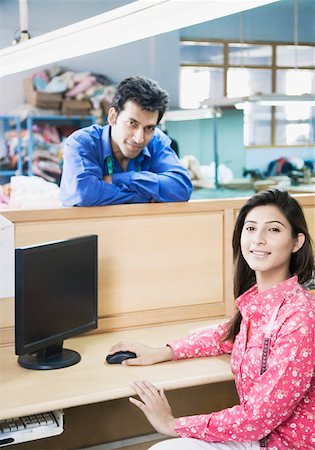 Portrait of two fashion designers in a textile industry Stock Photo - Premium Royalty-Free, Code: 630-01874319