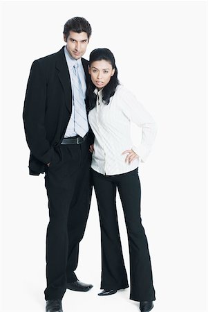 ethnic couple white background - Portrait of a young couple standing together Stock Photo - Premium Royalty-Free, Code: 630-01874359