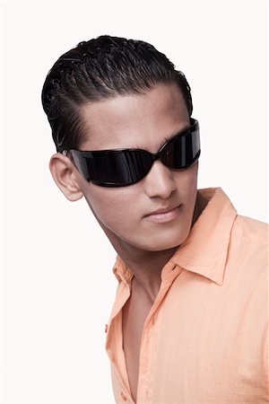 sunglasses on head - Close-up of a young man wearing sunglasses Stock Photo - Premium Royalty-Free, Code: 630-01875359