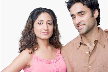 portrait and woman and closeup and arms - Portrait of a young couple smiling Stock Photo - Premium Royalty-Free, Code: 630-01875353