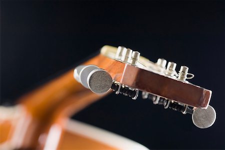simsearch:630-01876125,k - Close-up of an acoustic guitar Fotografie stock - Premium Royalty-Free, Codice: 630-01875579