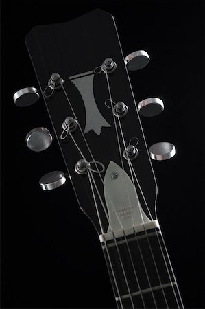 Close-up of strings of a guitar Stock Photo - Premium Royalty-Free, Code: 630-01875573