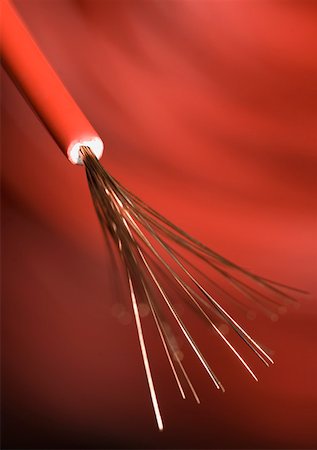 electric connection hazard - Close-up of a red power cable Stock Photo - Premium Royalty-Free, Code: 630-01875582