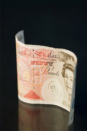 pound - Close-up of a fifty pound note Foto de stock - Sin royalties Premium, Código: 630-01875642