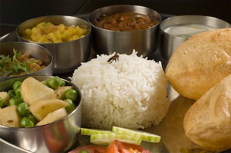 Close-up of assorted Indian food Foto de stock - Sin royalties Premium, Código: 630-01875684