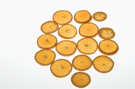 simsearch:630-01875786,k - Close-up of orange slices Foto de stock - Royalty Free Premium, Número: 630-01875707