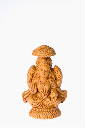 Close-up of a statue of Goddess Lakshmi Stock Photo - Premium Royalty-Free, Code: 630-01875721