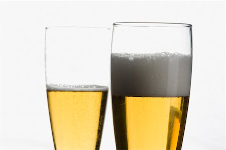 simsearch:630-01875796,k - Close-up of two glasses of beer Stock Photo - Premium Royalty-Free, Code: 630-01875804