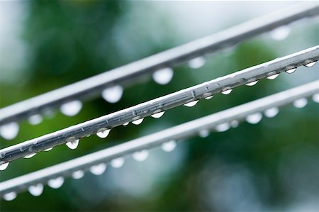 Close-up of water drops on wires Stock Photo - Premium Royalty-Free, Code: 630-01876021