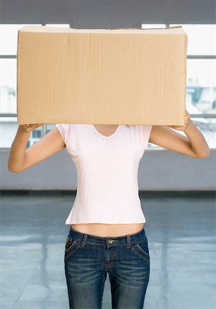 photos of asian people moving houses - Young woman holding a cardboard box in front of her face Stock Photo - Premium Royalty-Free, Code: 630-01876645