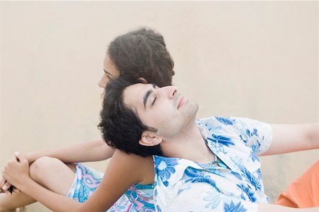 simsearch:630-01491245,k - Young couple sitting on the beach Stock Photo - Premium Royalty-Free, Code: 630-01876823