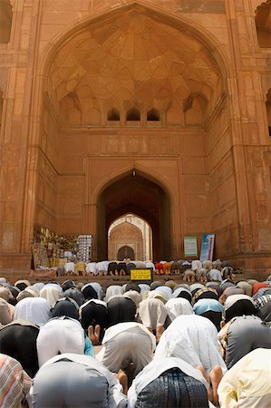 Rear view of a group of people praying in a mosque Stock Photo - Premium Royalty-Free, Code: 630-01877115