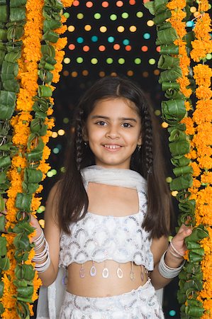 deepawali celebration girls - Close-up of a girl smiling Stock Photo - Premium Royalty-Free, Code: 630-01877231