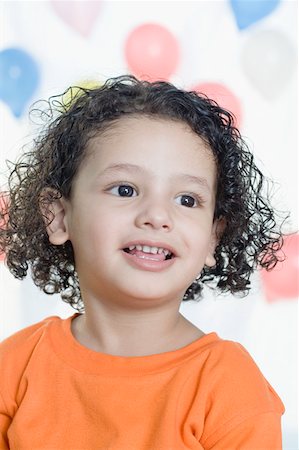 Close-up of a boy smiling Foto de stock - Sin royalties Premium, Código: 630-01877566
