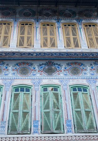 Low angle view of closed windows of a building, Pushkar, Rajasthan India Stock Photo - Premium Royalty-Free, Code: 630-01872122