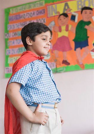 simsearch:630-01873530,k - Side profile of a boy imitating to be a superhero Stock Photo - Premium Royalty-Free, Code: 630-01873621