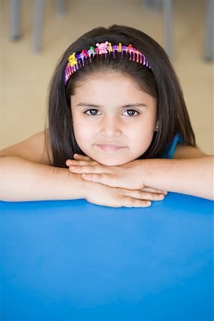 Portrait of a schoolgirl smiling Stock Photo - Premium Royalty-Free, Code: 630-01873755