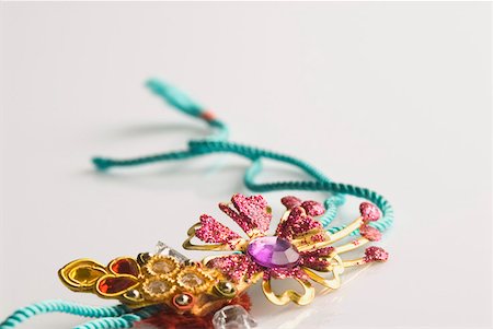 rakhi - Close-up of two rakhis Stock Photo - Premium Royalty-Free, Code: 630-02219272