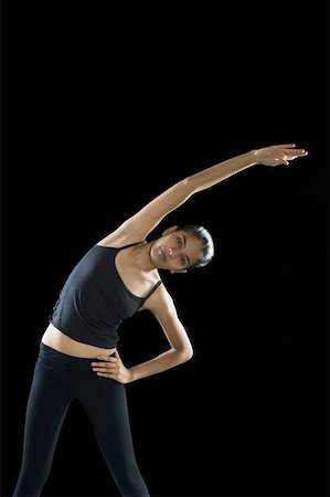 simsearch:630-02219883,k - Portrait of a young woman exercising Foto de stock - Sin royalties Premium, Código: 630-02219306