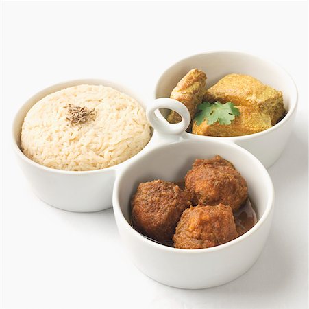 rice isolated - Close-up of boiled rice and meatballs with fish curry served in bowls Stock Photo - Premium Royalty-Free, Code: 630-02219387