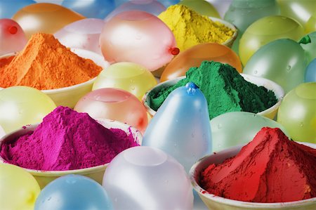 Close-up of water bombs and bowls of powder paint Stock Photo - Premium Royalty-Free, Code: 630-02219423