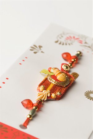 rakhi - Close-up of a rakhi Stock Photo - Premium Royalty-Free, Code: 630-02219648