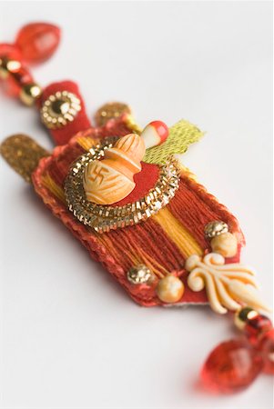 rakhi - Close-up of a rakhi Stock Photo - Premium Royalty-Free, Code: 630-02219652