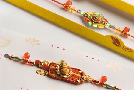 rakhi - Close-up of two rakhis Stock Photo - Premium Royalty-Free, Code: 630-02220032
