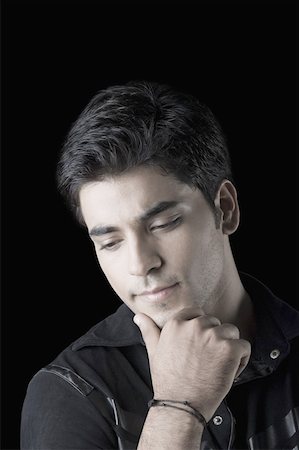 simsearch:630-02219895,k - Close-up of a young man thinking Stock Photo - Premium Royalty-Free, Code: 630-02220081