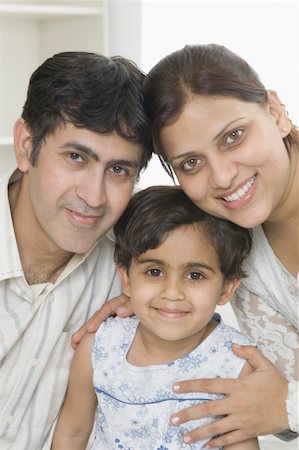 simsearch:630-02220759,k - Porträt eines Mitte Erwachsenen Paares lächelnd mit ihrer Tochter Stockbilder - Premium RF Lizenzfrei, Bildnummer: 630-02220186