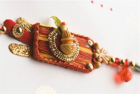 rakhi - Close-up of a rakhi Stock Photo - Premium Royalty-Free, Code: 630-02220242