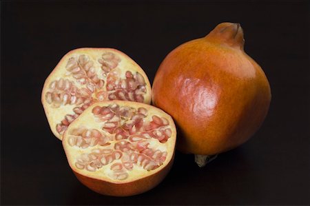 simsearch:640-02656973,k - Close-up of pomegranates Fotografie stock - Premium Royalty-Free, Codice: 630-02220292