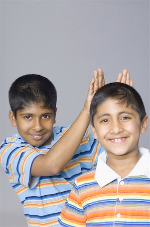 simsearch:630-02219895,k - Portrait of two boys smiling Stock Photo - Premium Royalty-Free, Code: 630-02220393