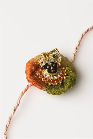 rakhi - Close-up of a rakhi Stock Photo - Premium Royalty-Free, Code: 630-02220438