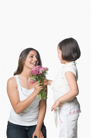 simsearch:630-02219353,k - Side profile of a girl with her mother holding a bunch of flowers Stock Photo - Premium Royalty-Free, Code: 630-02220513