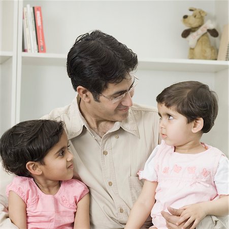 simsearch:630-02220024,k - Mid adult man with his arms around his two daughters Stock Photo - Premium Royalty-Free, Code: 630-02220932