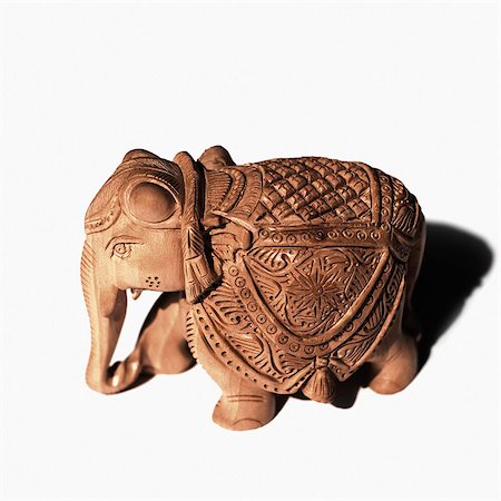elephant statuettes - Close-up of an elephant figurine Stock Photo - Premium Royalty-Free, Code: 630-03479278