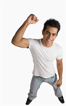 Portrait of a young man smiling Stock Photo - Premium Royalty-Free, Code: 630-03479389